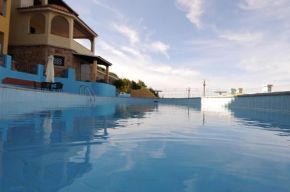 Гостиница Vallemare Residence e Studios  Байа Сардиния